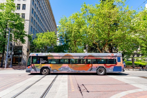 TriMet bus with an AAPI-themed bus wrap
