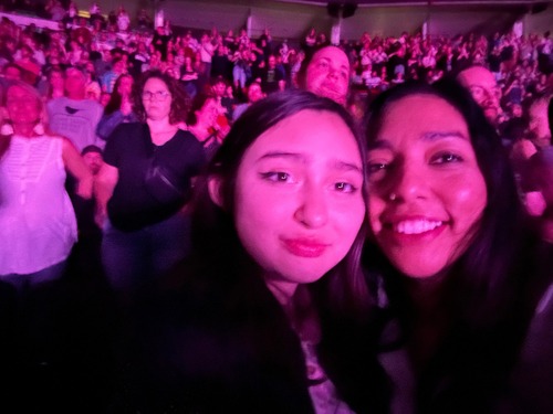 Two people at a concert