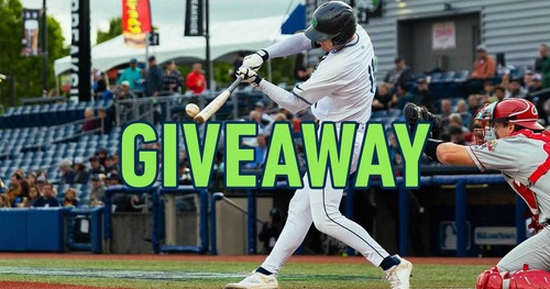 Hillsboro Hops player swinging a bat