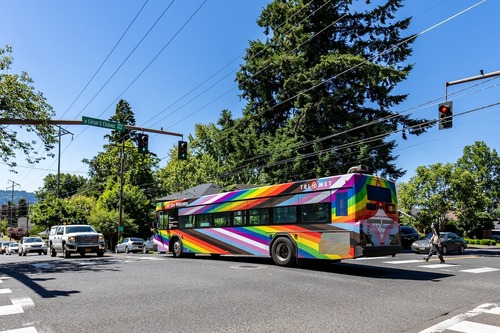 Bus wrapped in a colorful design 