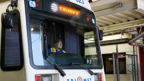 A MAX operator trainee takes the controls of a TriMet light rail vehicle.