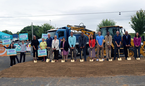 Portland Bureau of Transportation staff and partners pose with golden shovels at a groundbreaking ceremony for 82nd Avenue improvements.