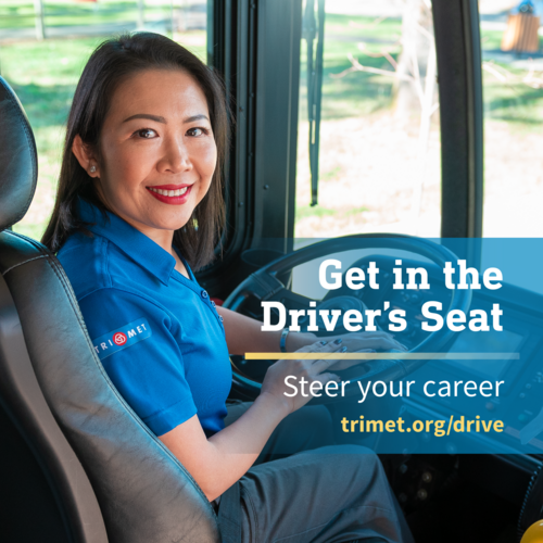 Woman bus operator smiling