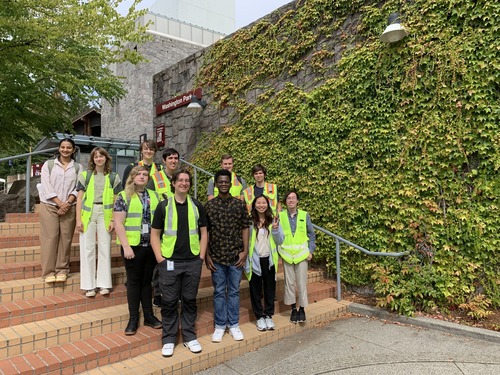 Interns posing in front of Washington Park