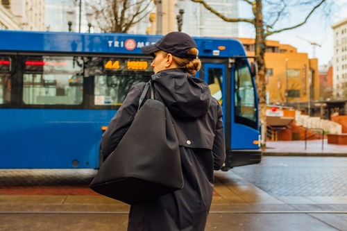 Person preparing to board TriMet bus in Downtown Portland