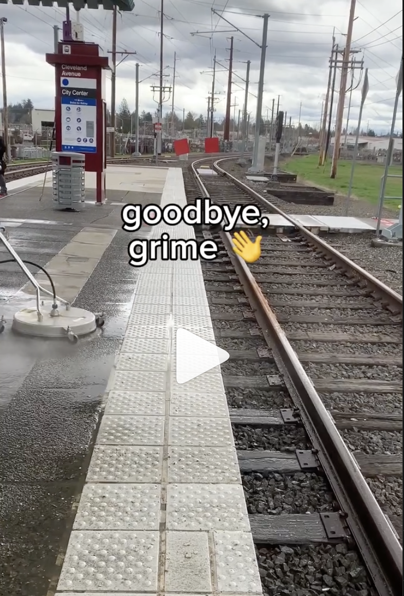 Machine cleaning off grime at Cleveland Ave MAX Station