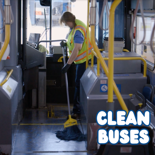 TriMet employee mopping the floor of a bus