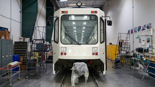 This is an image of a Type 1 light rail vehicle inside of a TriMet rail facility.