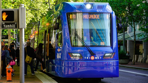 Image of a MAX Orange Line train at the Pioneer Place/SW 5th Ave MAX Station in Downtown Portland