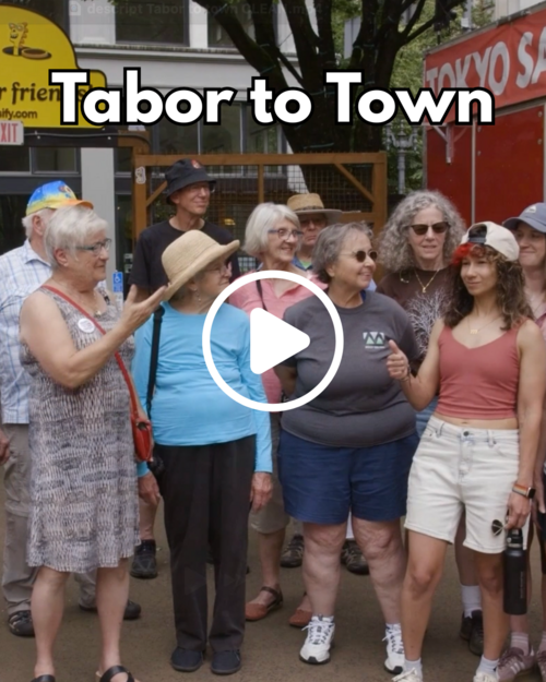 Group of people gathered in front of the Midtown Beer Garden food cart pods