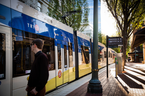 Image of a TriMet rider preparing to board a MAX train at Pioneer Square