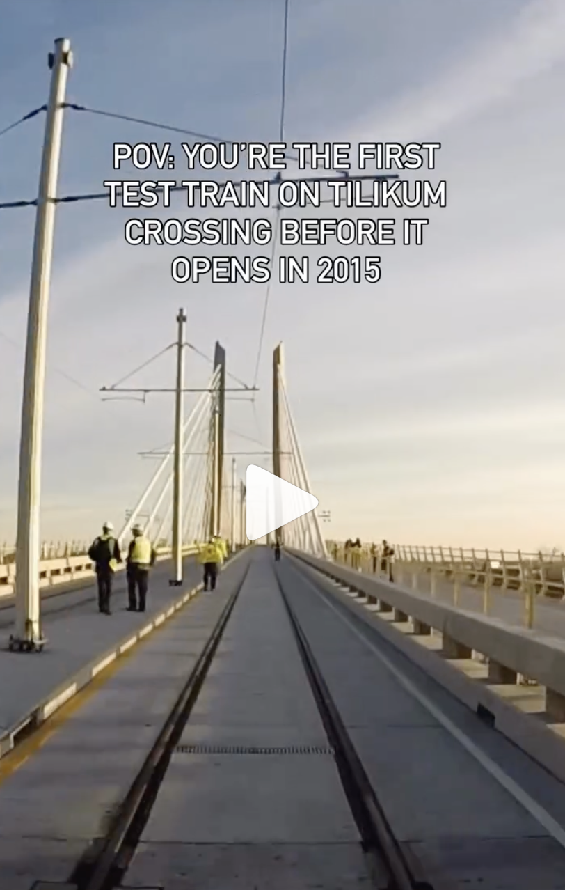 Tilikum Crossing with construction workers and inspectors on the bridge