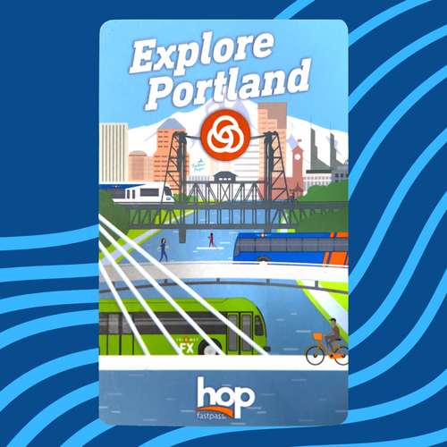 explore portland hop card featuring a cityscape and view of light rail and buses on two bridges