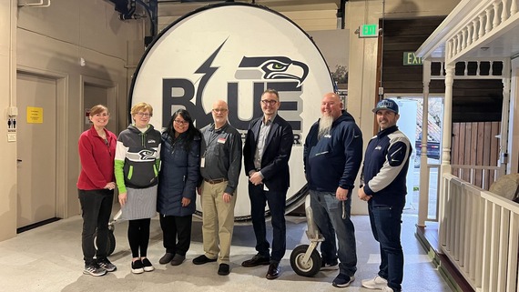 Seattle Seahawks Blue Thunder Drumline donates the largest drum to Renton History Museum  