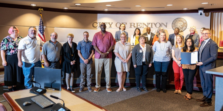 Renton Parks and Recreation posing with city councilmembers and Mayor Armondo Pavone for Parks and Recreation Month.