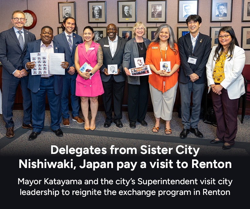 Group photo of delegates from Sister City Nishiwaki, Japan posing with Mayor Armondo Pavone and Renton councilmembers for a group photo