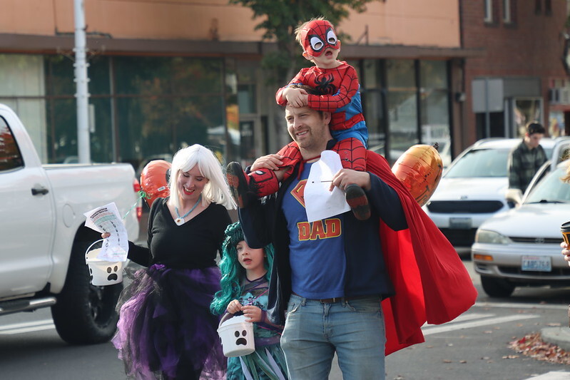 A family dressed up in Halloween costumes in Downtown Renton