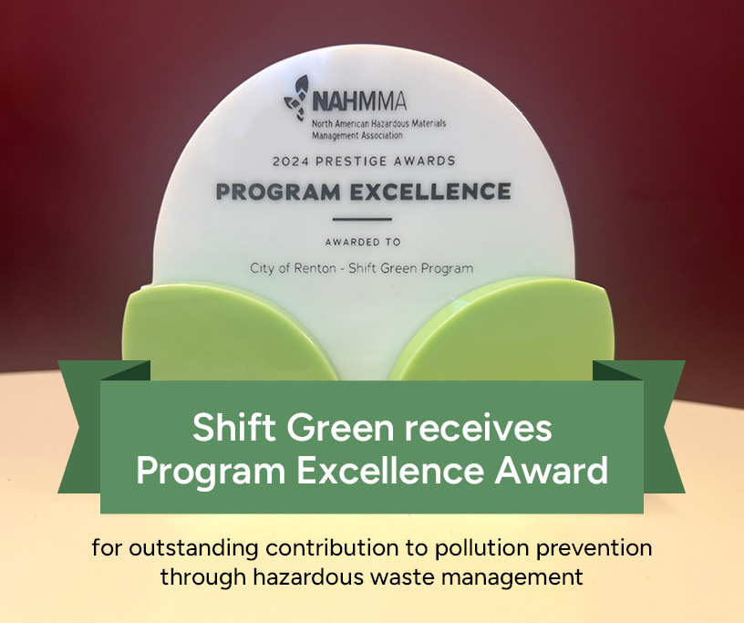 This Week in Renton header graphic showing the Shift Green Program's green colored Excellence Award against a mahogany background