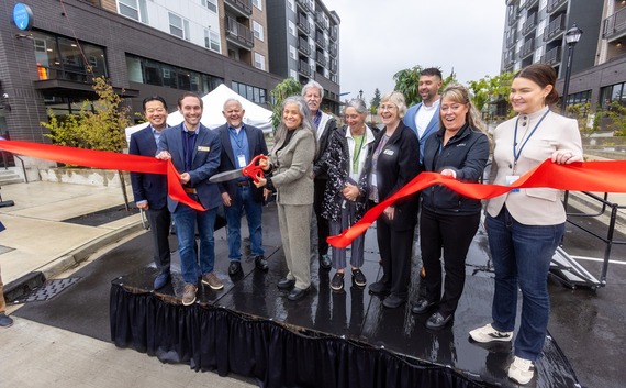 Solera Astra apartments grand opening event ribbon cutting group photo