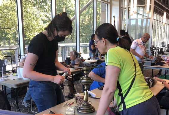 Volunteer fixers at King County repair event at Renton Library