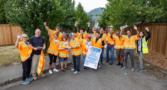 Volunteers working the storm drain marking project on Day of Service 2025