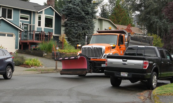 Winter Prep snowplow navigating a road