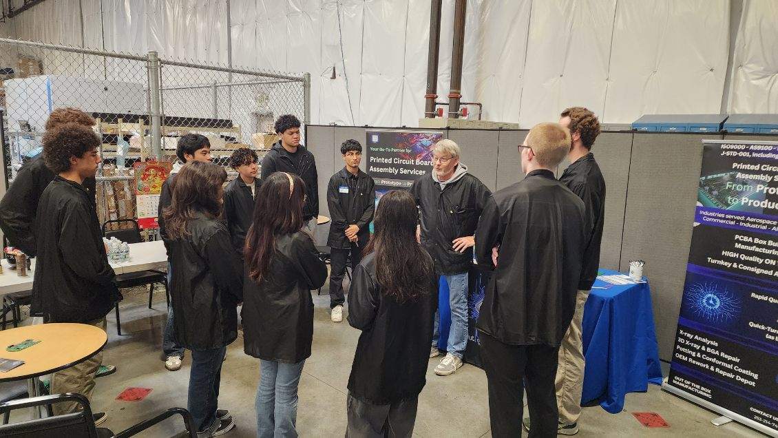 Students at Out of the Box Manufacturing on a field trip