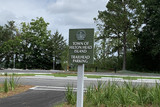 Parking area will serve as a trailhead for the pathways and linear park. 