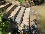 granite steps leading into the water