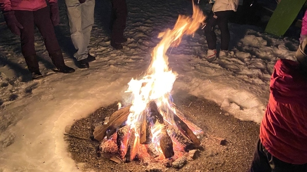 bonfire surrounded by snow