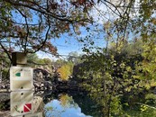quarry with water surrounded by trees