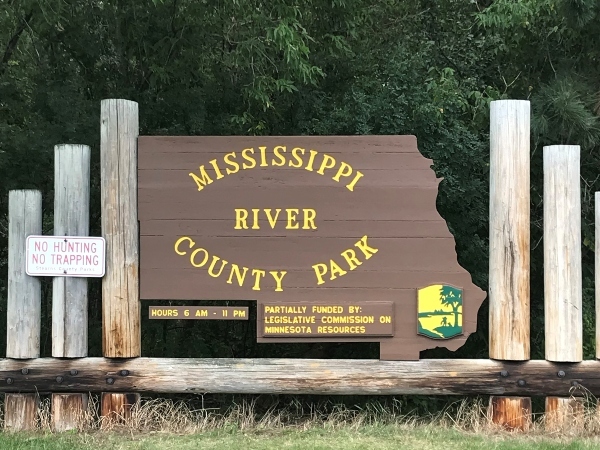 entrance sign to a park