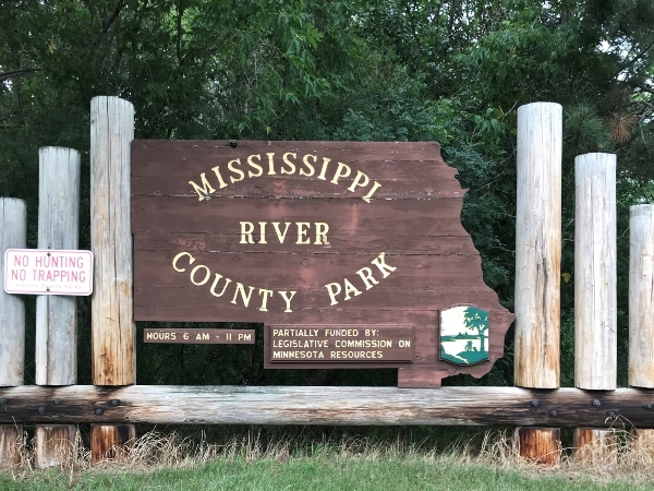 entrance sign to park