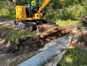 culvert being replaced under a trail