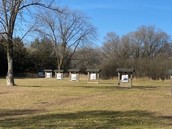 archery bags in a grassy field