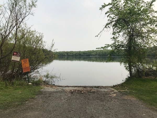 boat landing leading into lake