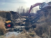 construction equipment replacing a culvert