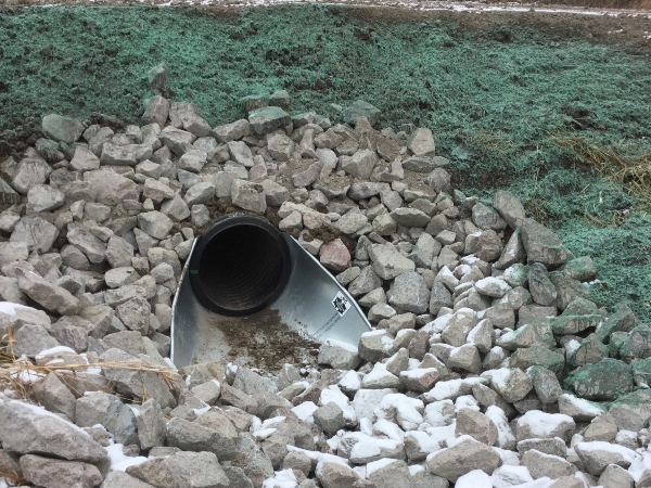 newly installed culvert under a trail