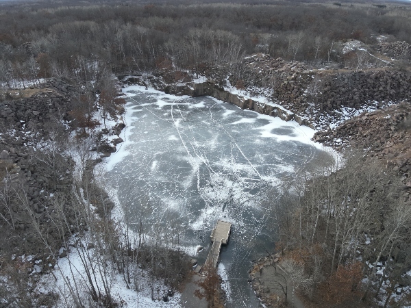 Drone view of frozen quarry