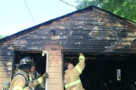 garage fire from careless smoking