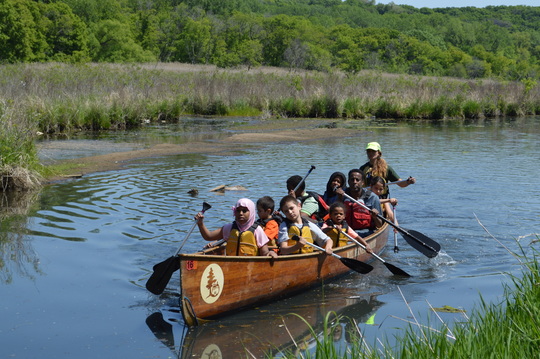 Voyageur canoe on Pigs Eye Lake