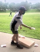 Adaptive Recreation participant playing bags. 