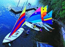 Colorful Sunfish sailboats on Lake Phalen.