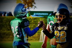 Two youth football players