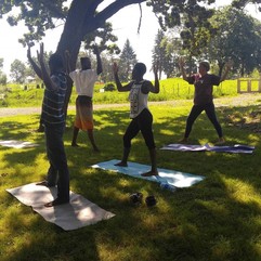 Fitness in the Parks--Small group doing yoga