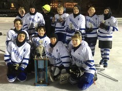 Langford Park Youth Hockey Team on the ice wearing blue and white uniforms