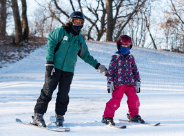 Instructor and student at Como Park Ski Center