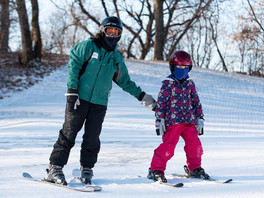 Instructor and student at Como Park Ski Center