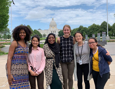 Right Track workers in front of the Capitol building