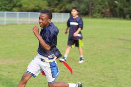 Flag football player running